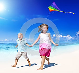 Sibling playing together on the beach