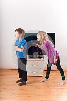 Siblings conflict over the remote control