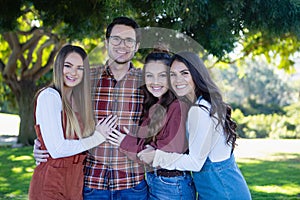 Siblings and cousins at a park