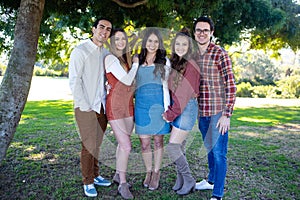 Siblings and cousins at a park