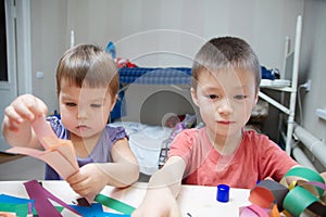 Siblings crafting, children development concept