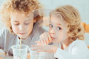 Siblings drinking healthy milk