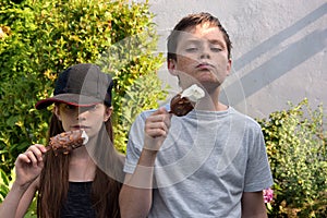 Siblings eating ice cream