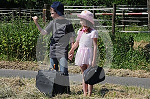 Siblings hitchhiking