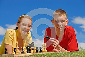 Siblings play chess