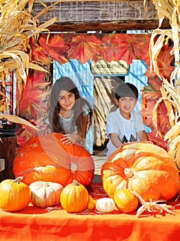 Siblings at pumpkin patch