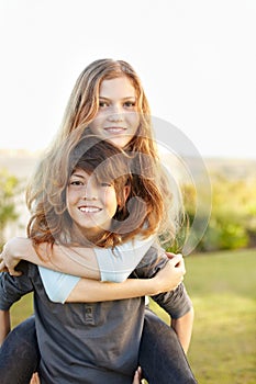 Siblings, teenager or back portrait smile for childhood memories, weekend activity on field. Sister, brother or face