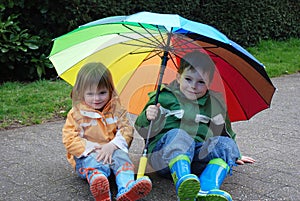 Siblings with umbrella
