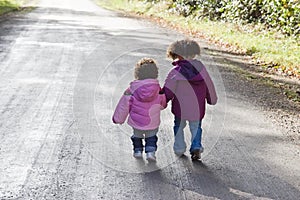 Siblings Walking