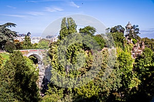 Sibyl temple and pond in Buttes-Chaumont Park, Paris