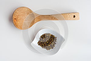 Sichuan green peppercorn with wood spoon