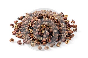 Sichuan pepper placed on a white background