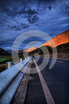 Sichuan Province, China Xinduqiao mountain road Sunset