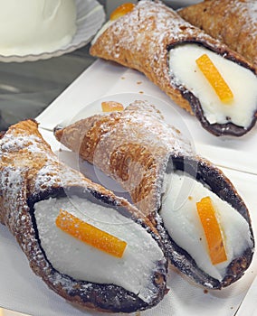 Sicilian cannoli pastries from Southern Italy made with ricotta Cheese and orange