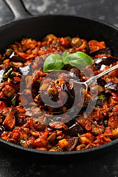Sicilian Eggplant, Aubergine caponata in iron cast pan
