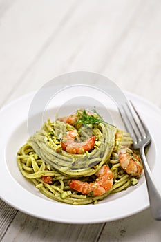 Sicilian pasta with pistachio pesto and shrimp photo