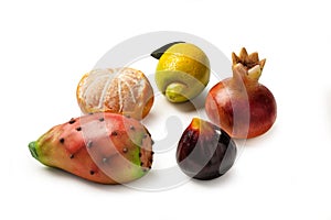 Marzipan fruits on a white background photo