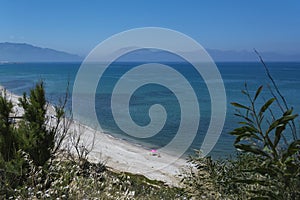 Sicily beautiful seaside beach with sunbathers