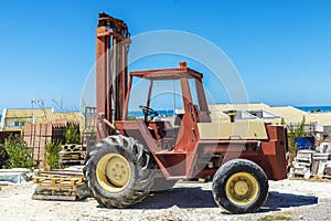 Old forklift in a construction site in Sicily, Italy
