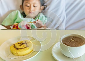 Sick Asian Child Hospital Patient on Bed with Breakfast Meals Menu