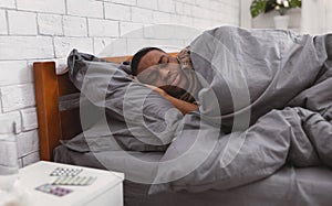 Sick Black Man Sleeping In Bed Having Flu At Home