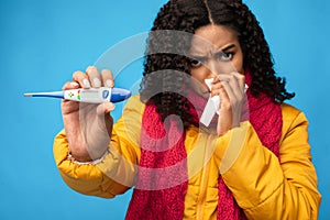 Sick Black Woman Showing Thermometer Having Fever Over Blue Background