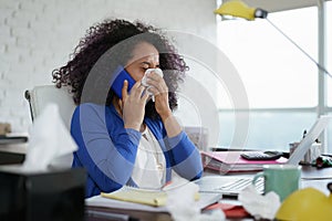 Sick Black Woman Working from Home Sneezing For Cold