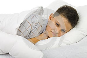 Sick boy in bed