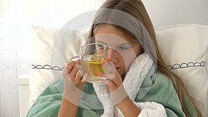 Sick Child Drinking Tea,Ill Kid in Bed,Blonde Girl Suffering from Cold,Patient in Hospital,Children Medical Healthcare