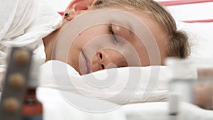 Sick Child Sleeping in Bed, Suffering Ill Kid Sleeping in Hospital Medicine Pill