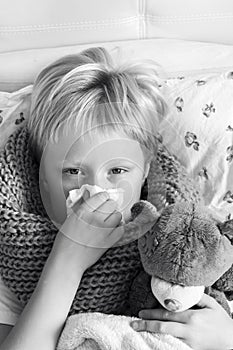 Sick child with teddy bear