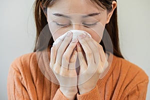 Sick, Coronavirus covid asian young woman, girl have a fever, flu, hand in use tissues paper sneezing nose, runny and cough,