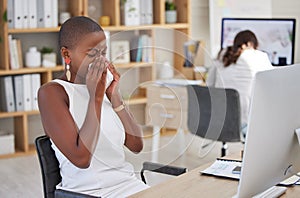 Sick corporate employee suffering with the flu, cold or covid while working in an office. Young professional with sinus