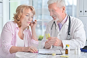 Sick elderly woman in a doctor`s office