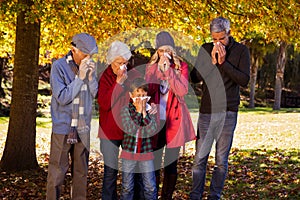 Sick family using tissues