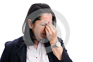 Sick female entrepreneur touching nose as sinusitis symptom
