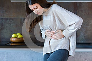 Sick female with stomachache. Health care concept