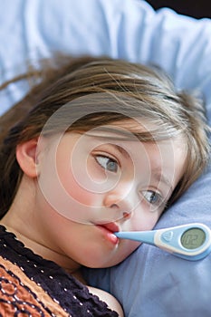 Sick Girl With Fever photo