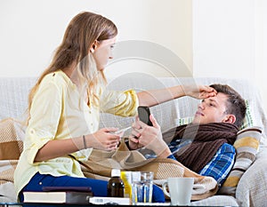 Sick guy with flue and nursing girl