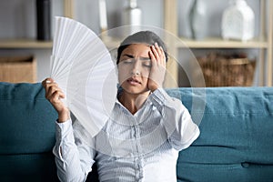 Sick indian girl feel unwell suffer from heatstroke photo