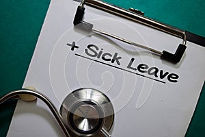 Sick Leave write on a paperwork isolated on Office Desk
