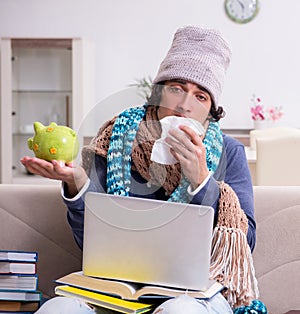 Sick male student suffering at home