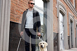 Sick man with blindness get help by dog guide