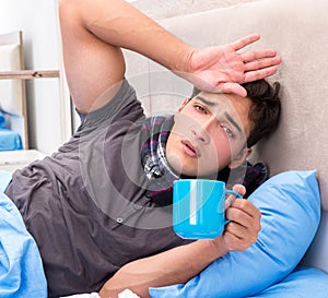 Sick man with flu lying in the bed