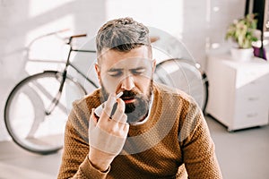 Sick man with runny nose