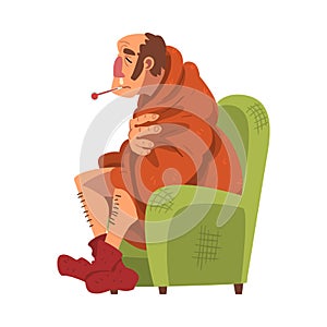 Sick Man Sitting on Armchair Wrapped in Plaid, Guy with Flu Wearing Knitted Socks Measuring Temperature with Thermometer