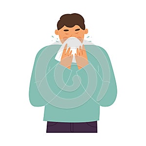 Sick man sneezes into a handkerchief
