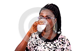 Sick mature woman drinking water with effervescent tablet