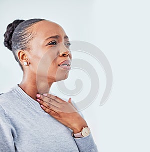 Sick, mockup and black woman with sore throat in studio for influenza, cold or allergies on white background. Cough