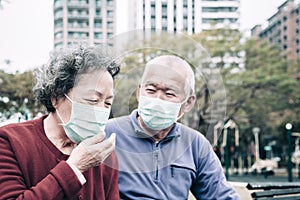 Sick senior couple  wear with protective face mask